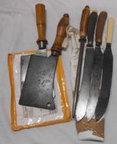 Three old carving knives and a sharpener - sold with two antique meat cleavers