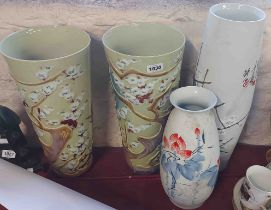 A pair of large 20th Century Chinese porcelain vases with moulded and hand painted enamel prunus