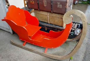 A decorative wooden sleigh