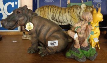 A small quantity of collectable figurines comprising a hippopotamus, tiger, Gollum and two