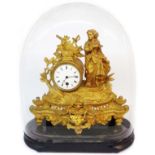 A late 19th Century ornate gilt spelter salon timepiece with female figure and other items, with