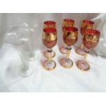 A set of six Italian decorative glasses - sold with two small clear trailed glass bud vases