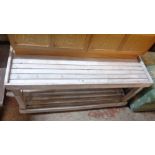 A 1.1m modern painted pine coffee table with slatted top and undertier