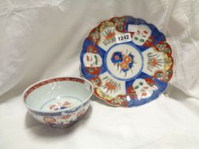 An antique Chinese porcelain bowl with Imari style decoration (a/f) - sold with a Japanese Imari