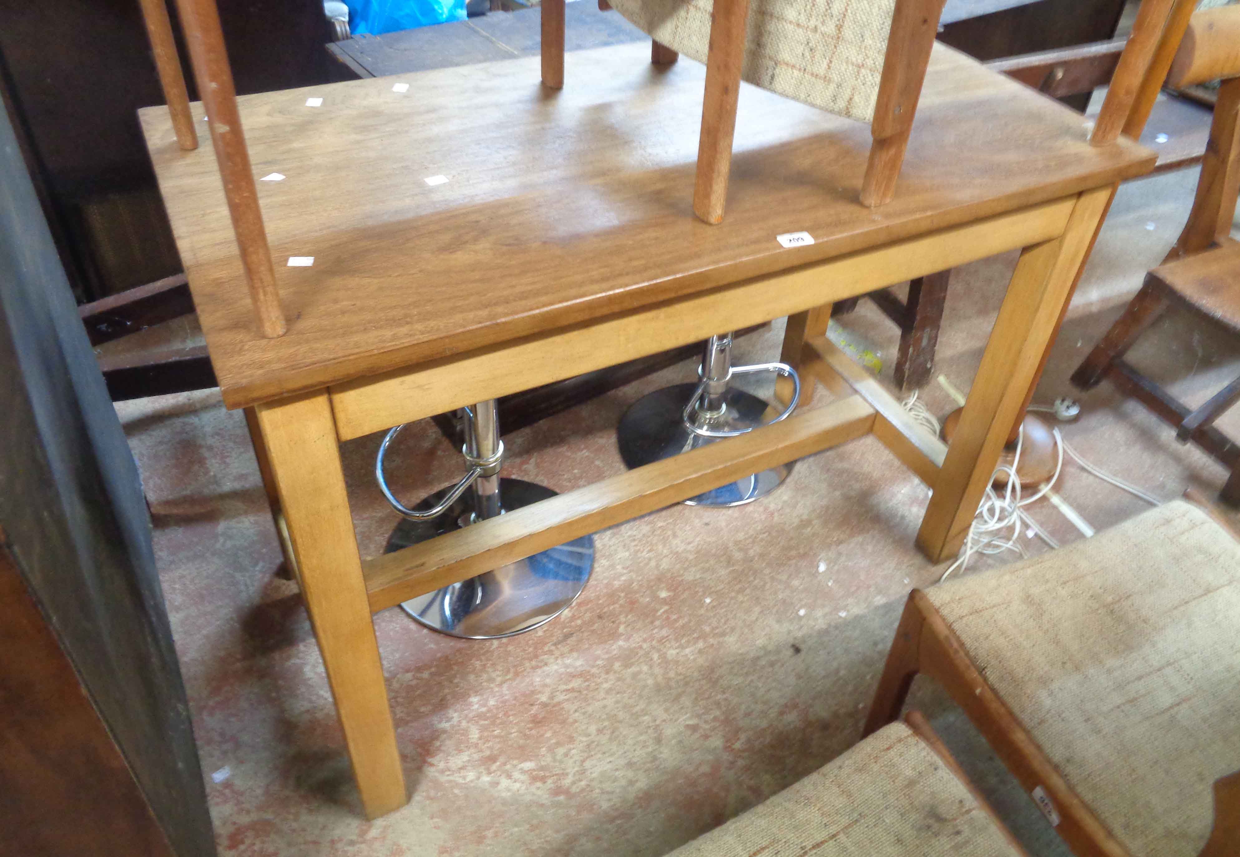 A 1.2m vintage hardwood laboratory table, set on heavy square supports