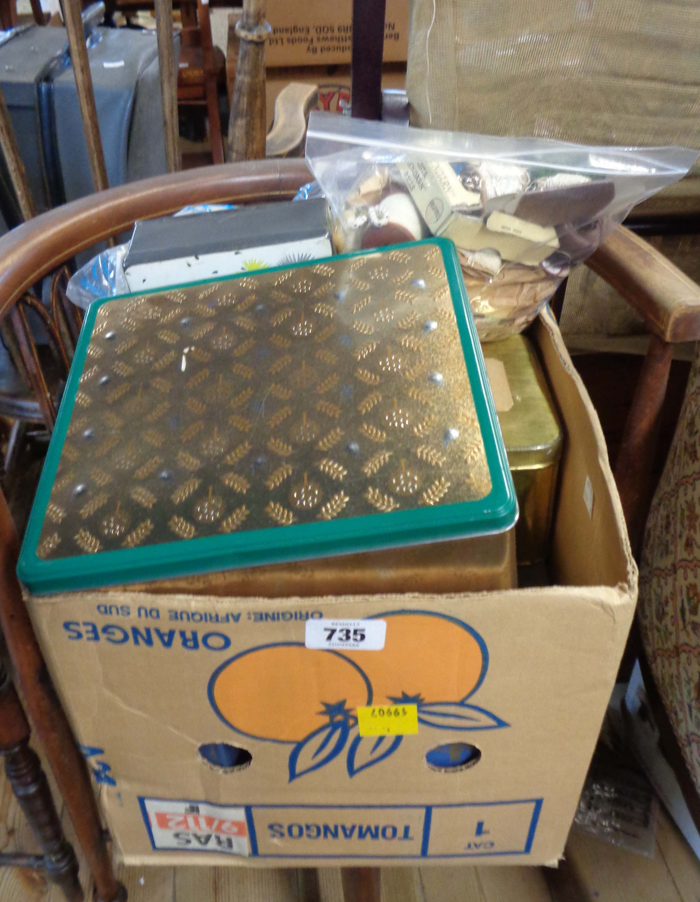 A box containing a large quantity of sewing related items including buttons, yarns, etc.