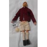 A vintage Action Man footballer in earlier West Ham strip complete with original football