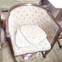 An early 20th Century mahogany part show frame tub elbow chair with upholstered back and seat, set