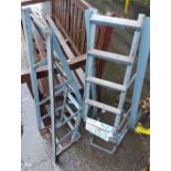 A pair of metal vehicle ramps