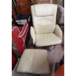 A modern Ikea reclining easy chair with cream leatherette upholstery, set on a swivel base - sold