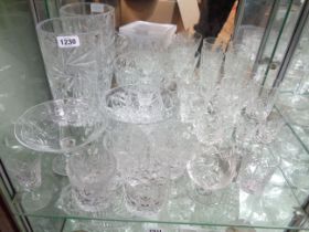 A quantity of cut glassware including drinking glasses, vases, bowls, etc.
