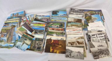 A shoebox containing a collection of 20th Century postcards including topographic, named views,