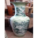 A very large 20th Century Chinese porcelain vase with hand painted landscape decoration in a