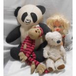 A bag containing two vintage Teddy bears and a doll