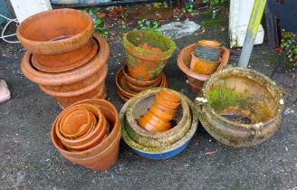 A quantity of terracotta pots