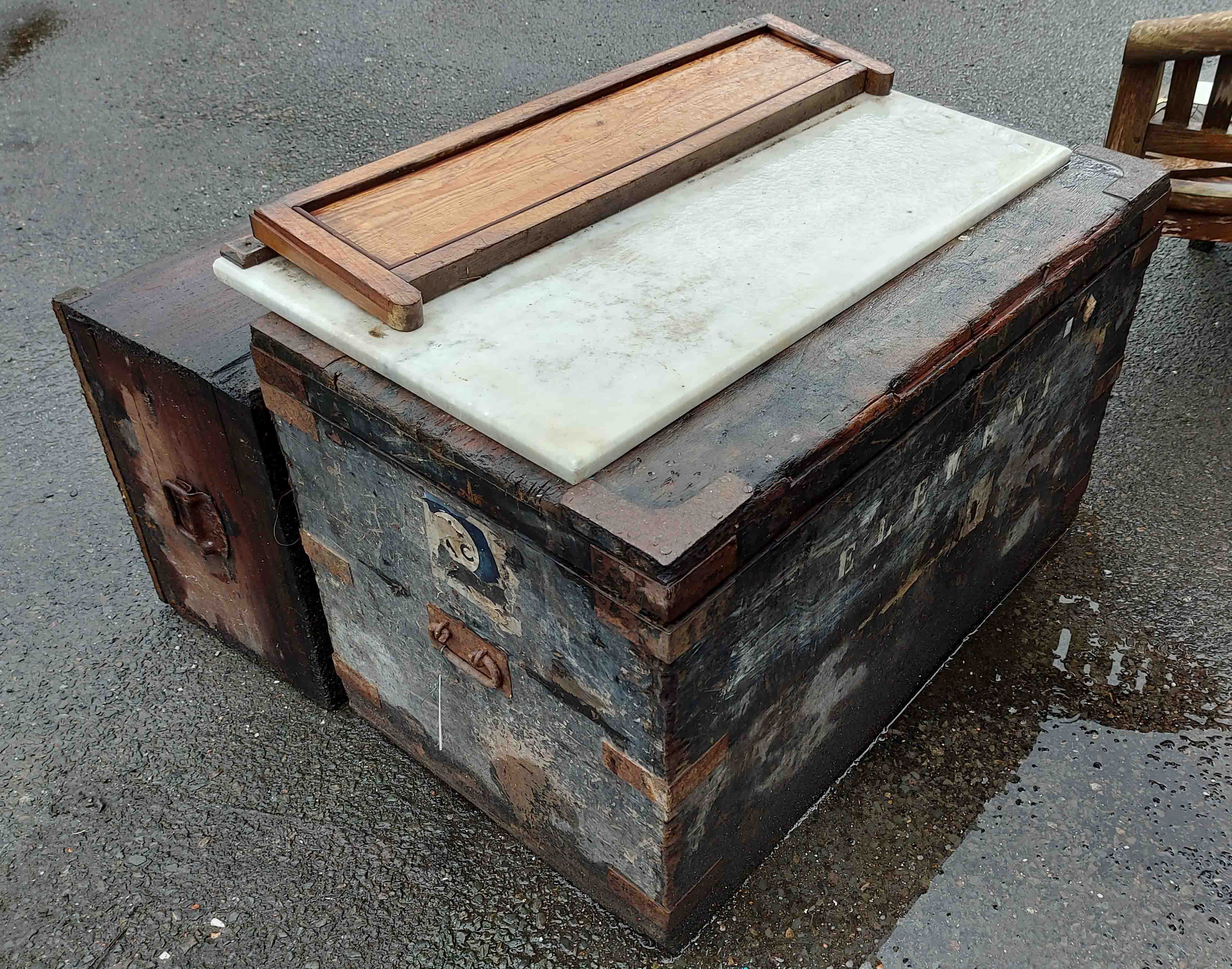 Two old wooden trunks - sold with a loose marble top