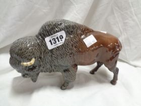 A Beswick pottery figurine, depicting a bison - model No. 1019