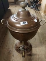 A old copper samovar with brass tap and wooden finial