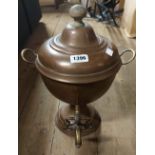 A old copper samovar with brass tap and wooden finial