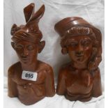 A pair of Indonesian carved hardwood busts