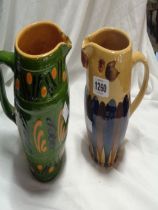 A vintage French pottery jug of owl form with coloured slip decoration (a/f to foot) - sold with