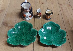 A small quantity of ceramics including two Wedgwood green glazed majolica leaf dishes, two toby