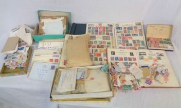 A collection of mainly 20th Century GB and world stamps comprising four albums with hinge mounted