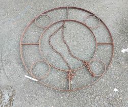 An old rusted metal hanging rack