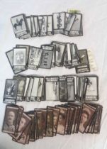 Four small bundles of vintage cigarette cards including Ogden's and Wills' monochrome photographic