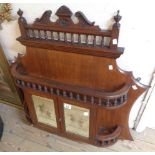 A 90cm Edwardian mahogany wall mounted cabinet with spindle galleries, flanking display shelves