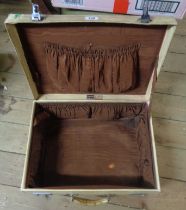 A vintage Carmichaels cream vellum clad suitcase with brown fabric interior lining
