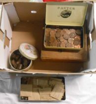 A tin containing antique and later copper coinage in envelopes and a quantity of three penny