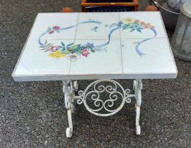 A small table with inset tiled top