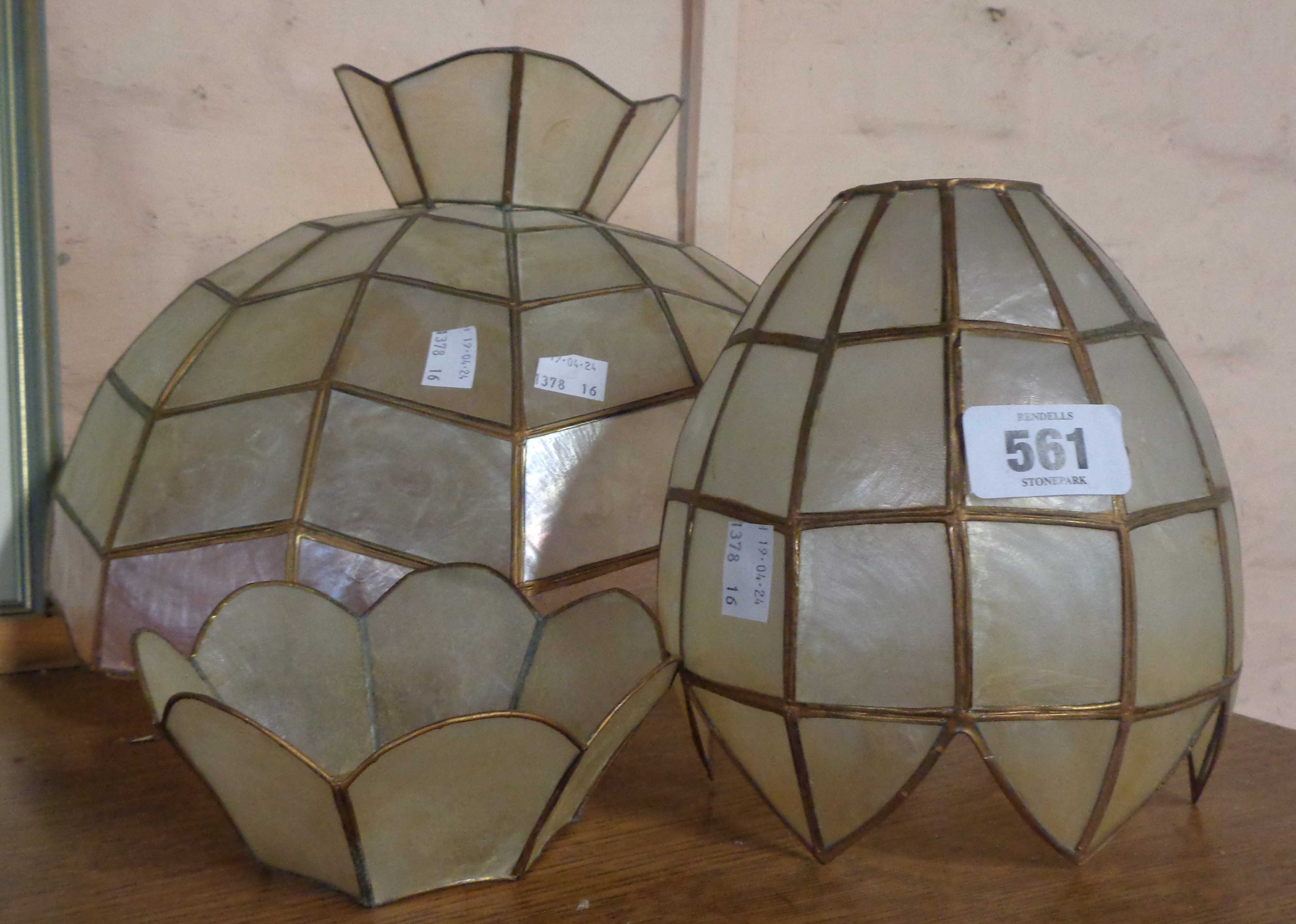 Two brass and shell lampshades