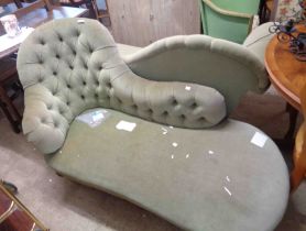 A pair of 1.5m Victorian camel back chaise longues with button back green velour upholstery, set