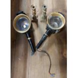 A pair of old coach lamps with black painted body and brass fittings, converted to electric - one