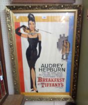 A gilt framed coloured art poster for the movie Breakfast at Tiffany's (no cast details) - 84cm X