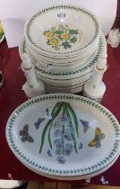 A quantity of Portmeirion pottery decorated in the Botanic Garden pattern comprising plates, bowls