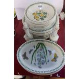 A quantity of Portmeirion pottery decorated in the Botanic Garden pattern comprising plates, bowls