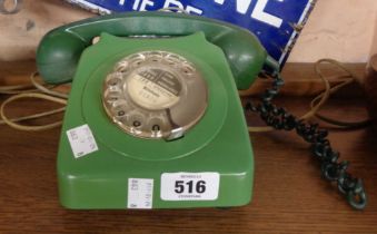 A vintage green dial telephone