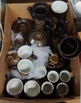 A box containing a quantity of Denby stoneware tableware in the Arabesque pattern including coffee