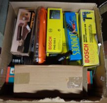 A box containing a quantity of tools including three Bosch, a Vitrex tile cutter, an angle