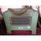 A small green painted cast iron Mysto heater