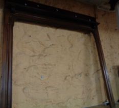 A Victorian mahogany fire surround with bracketed shelf to top