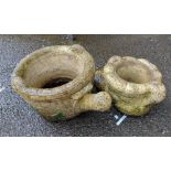 A large concrete planter in the form of a watering can - sold with another in the form of a boot