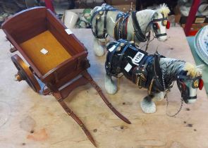 Two ceramic cart horse figurines with horse brass straps and tack - sold with a wooden cart