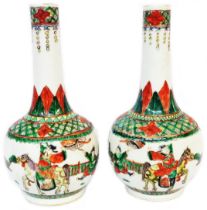 A pair of antique Chinese porcelain vases of bottle form with hand painted famille verte
