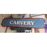 A vintage railway 'Carvery' sign with gloss red border and shadowing to the white transfer letters