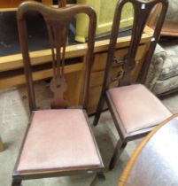 A pair of antique mahogany framed Queen Anne style pierced splat back dining chairs with upholstered