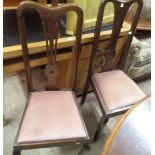 A pair of antique mahogany framed Queen Anne style pierced splat back dining chairs with upholstered